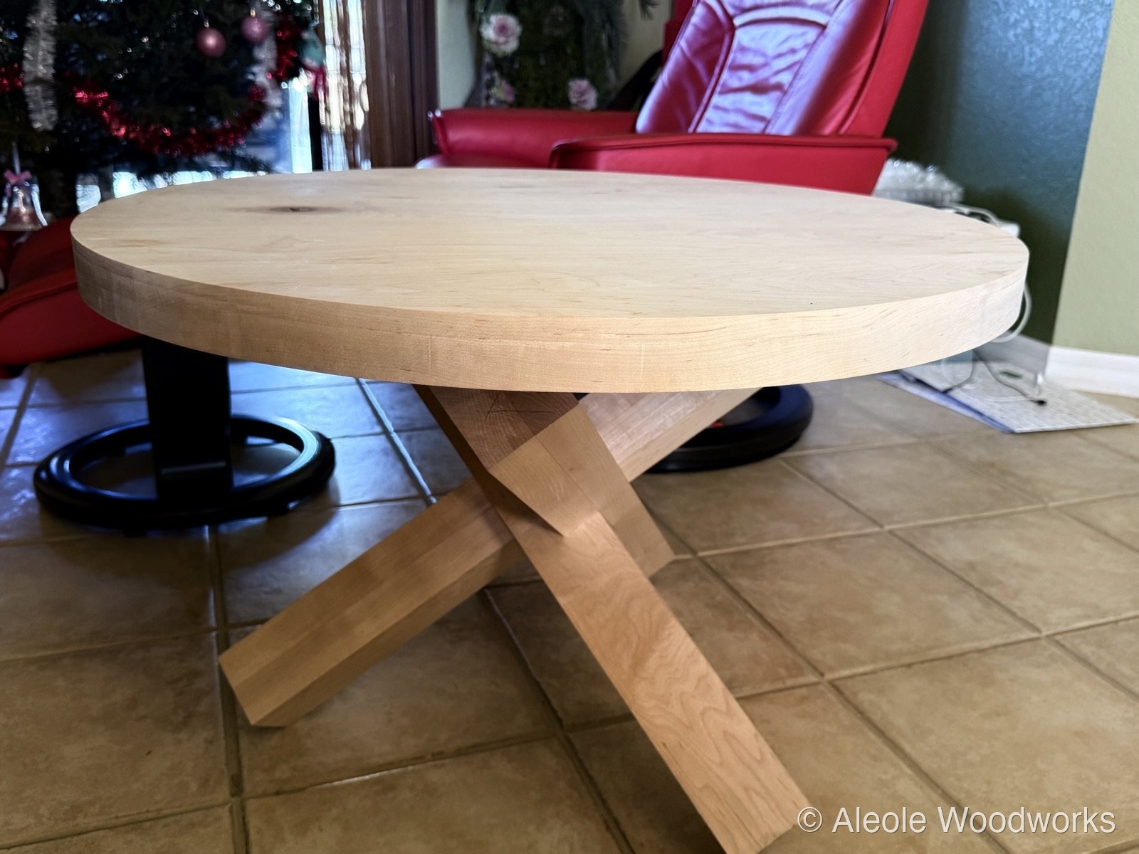 Maple tripod coffee table in client's living room