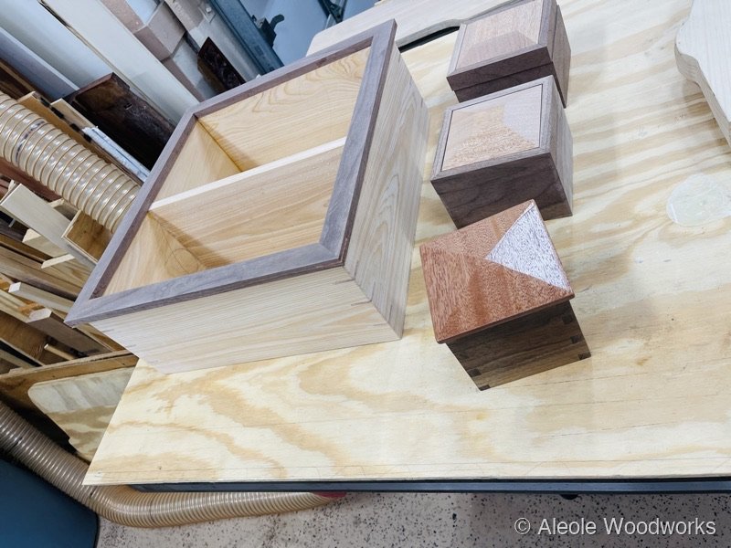 Keepsake box collection on workbench